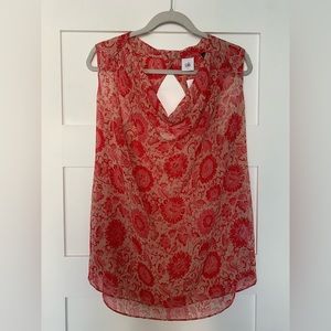 New with tags~Cabi sheer top~lovely pop of colors~peep hole in back~size S
